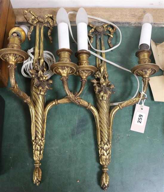 A pair of Louis XVI ormolu twin-branch wall lights height 48cm